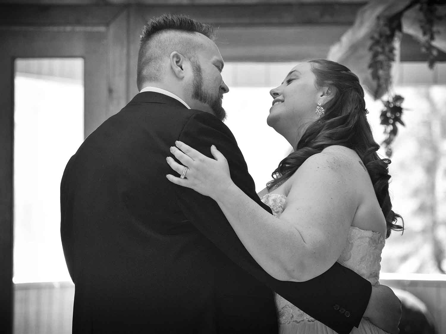 Melissa Lanasa and Darrell Adam Stallings married at Cove Lake Community Center on April 9, 2016. The couple enjoys their first dance together as man and wife.photos by Brianna Bivens - 2016