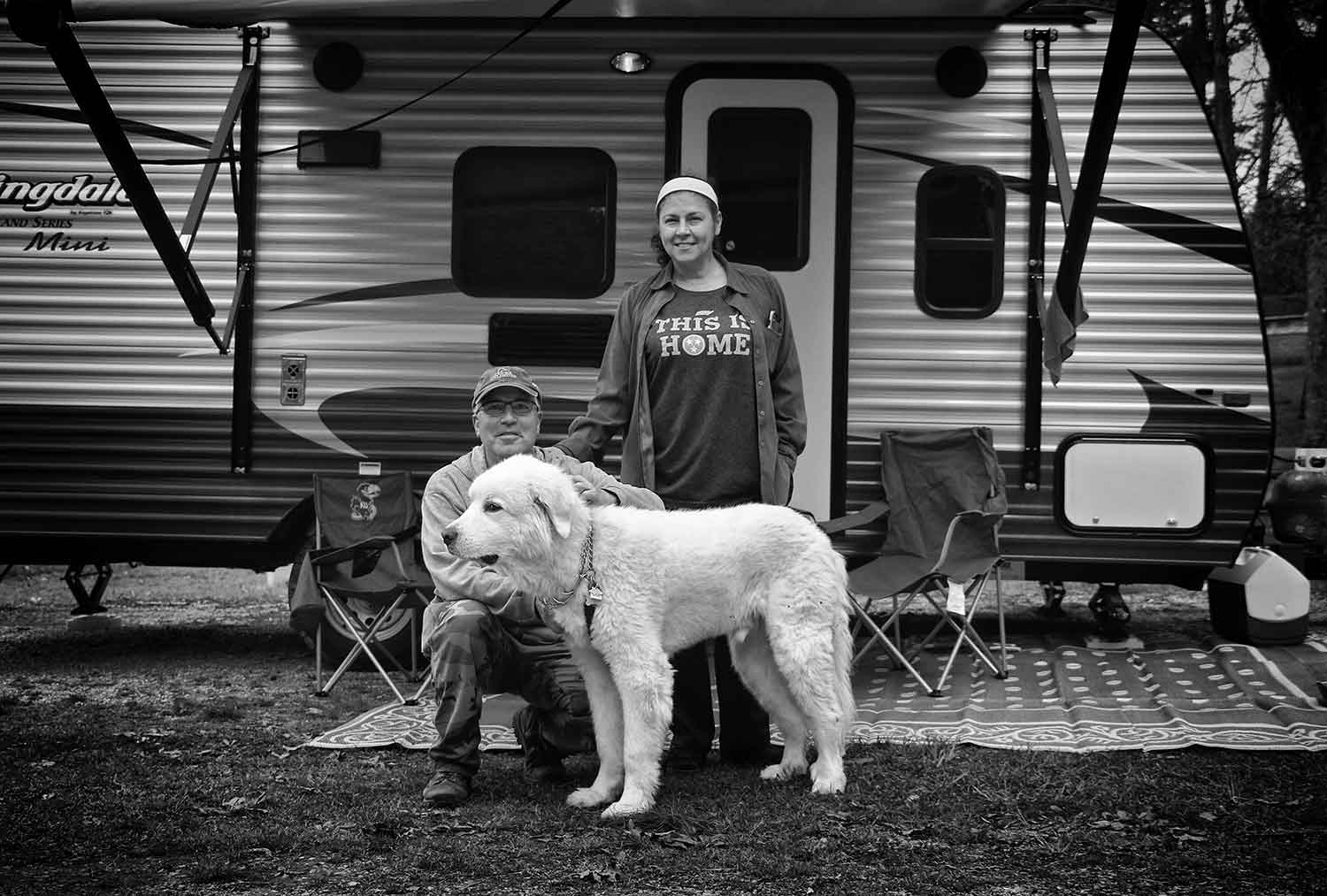 Steven, Marigol, and their dog Olympus from Sevierville, camp at Cove Lake State Park Campground. photo by Caleb Jones - 2018