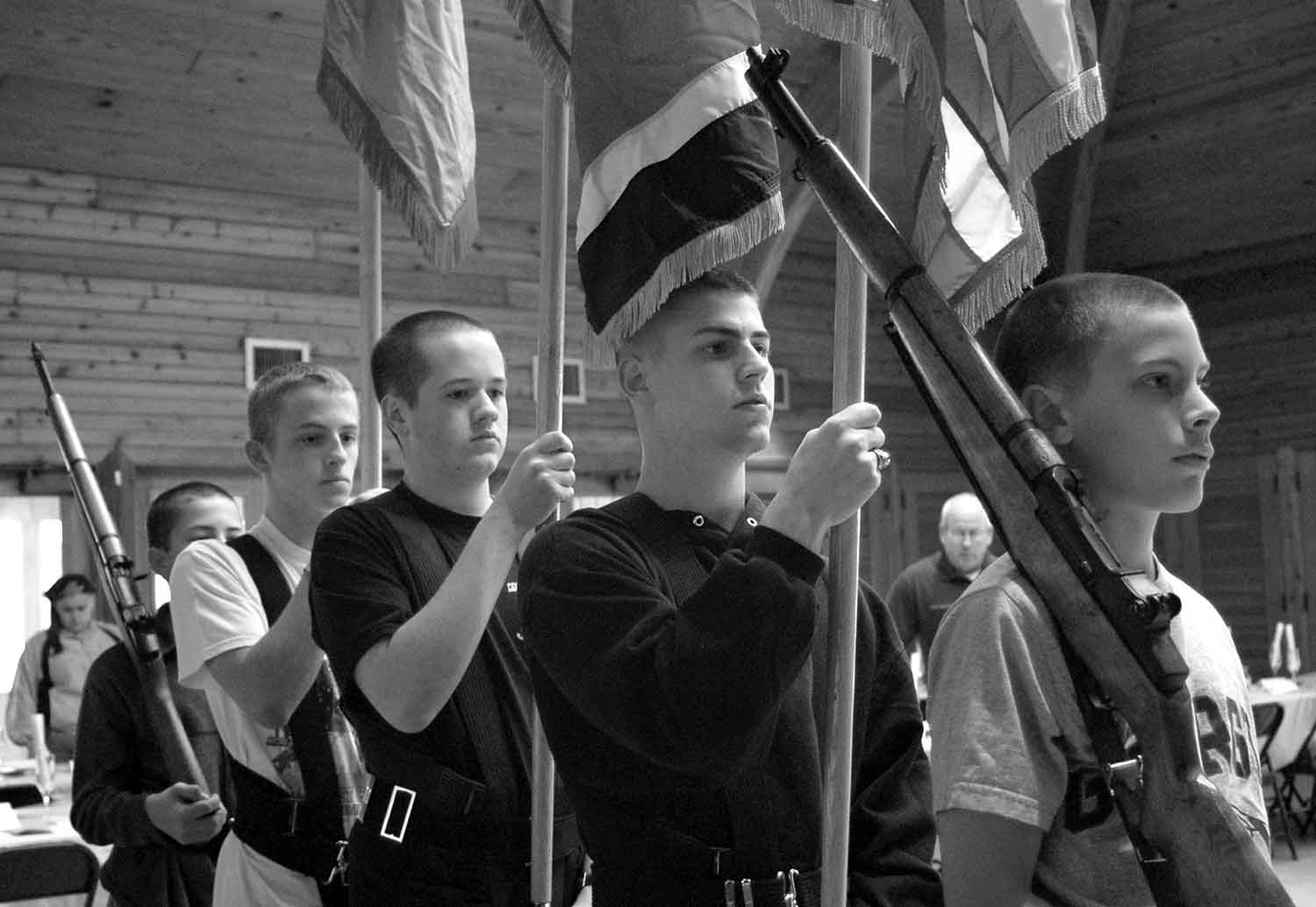 (left to right) Robert Sopha. James Olson, John Stooksbury, Chad Gilliam and Will Morris rehearse the color guard for the JROTC Military Ball. photo by Grace Wade - 2007