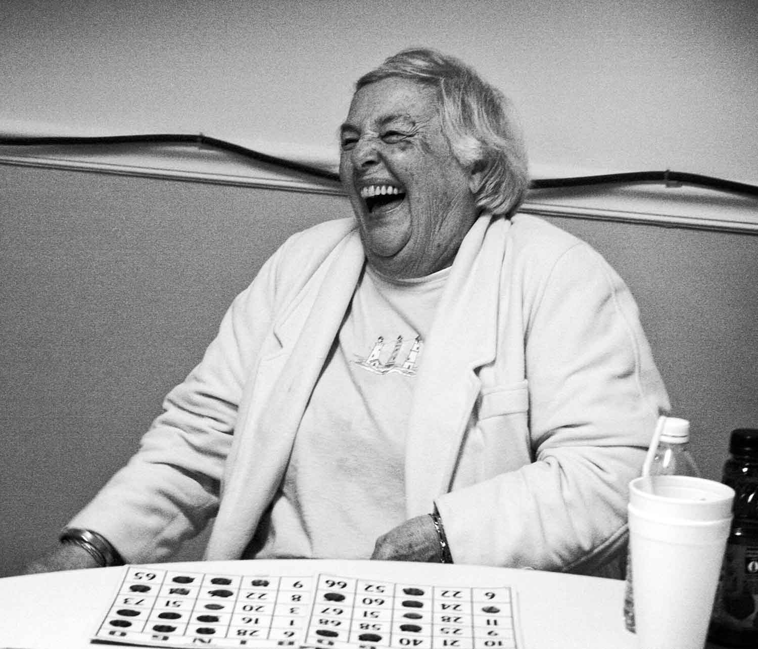 Janice Burris laughs off one of several false wins during a bingo game at the LaFollette Senior Center. photo by Anne Whitworth - 2009