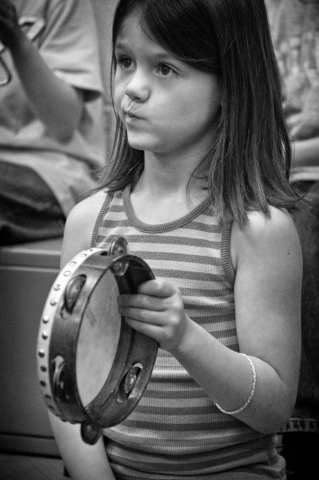 Second grader Samantha McNay concentrates while playing the tambourine in Freeman’s music class. - 2009