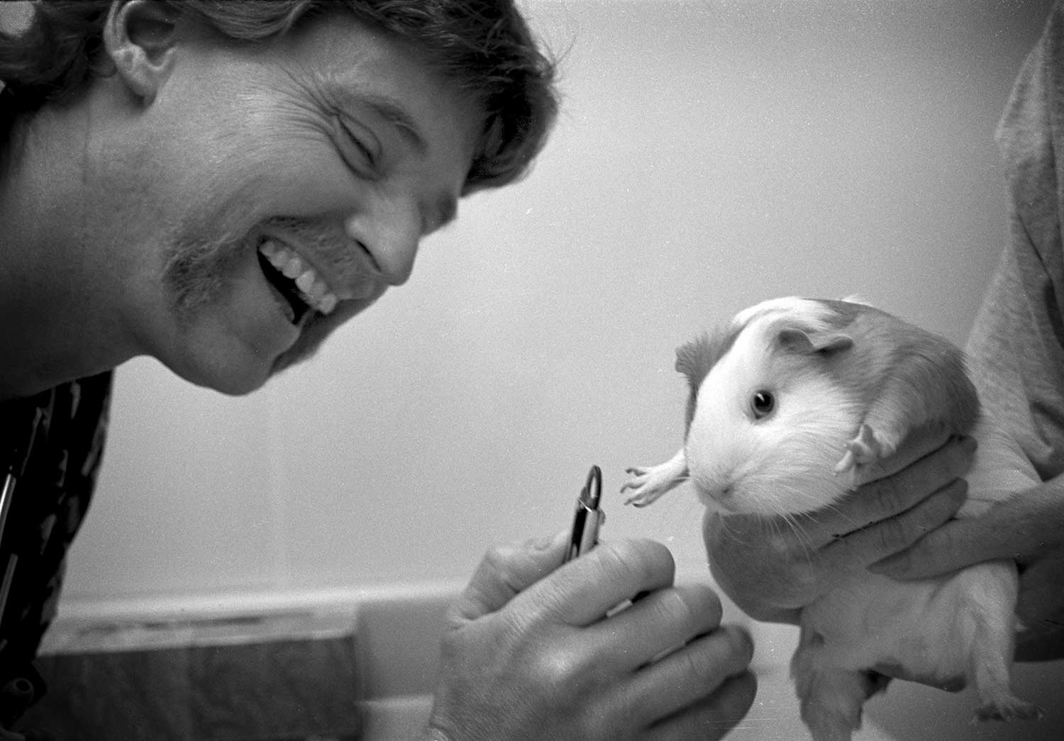 Veterinarian Bill Sander takes a break from surgery Friday to trim a patient’s toenails. photo by Cory Soldwedel- 1999