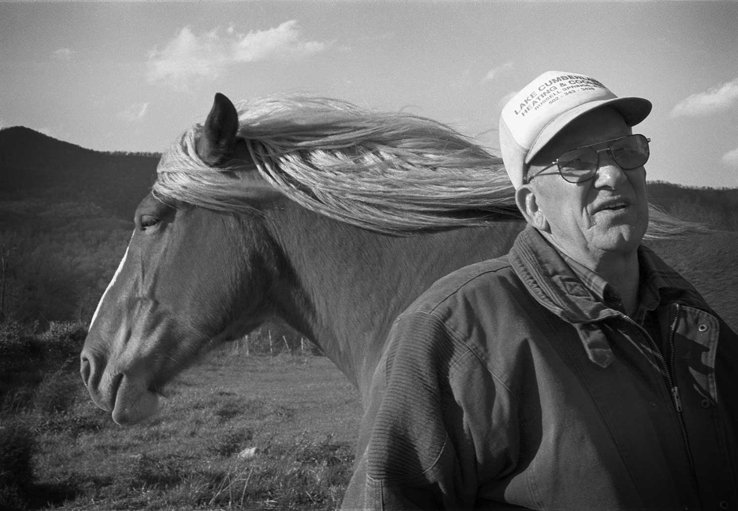 Local horse buyer Bill Claiborne does a bit of shopping Friday afternoon as the Shepherd’s family farm. photo by Matt Emigh - 1999
