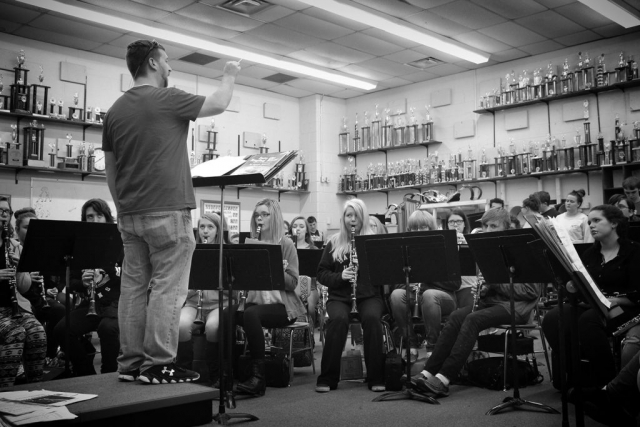 Adam Wright conducts the band at CCHS. photo by Joy Wang - 2017