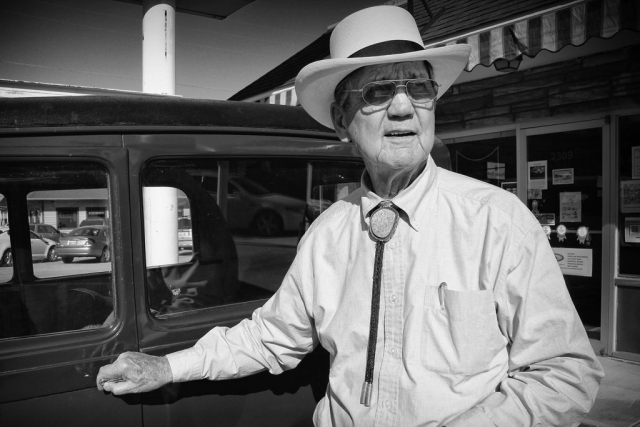 Iconic LaFollette resident, businessman and auctioneer, “Hack” Ayres has deep roots within Campbell County. He can be spotted around town wearing a tall, white straw hat and driving a bright-yellow truck. photo by Lauren Beets - 2013