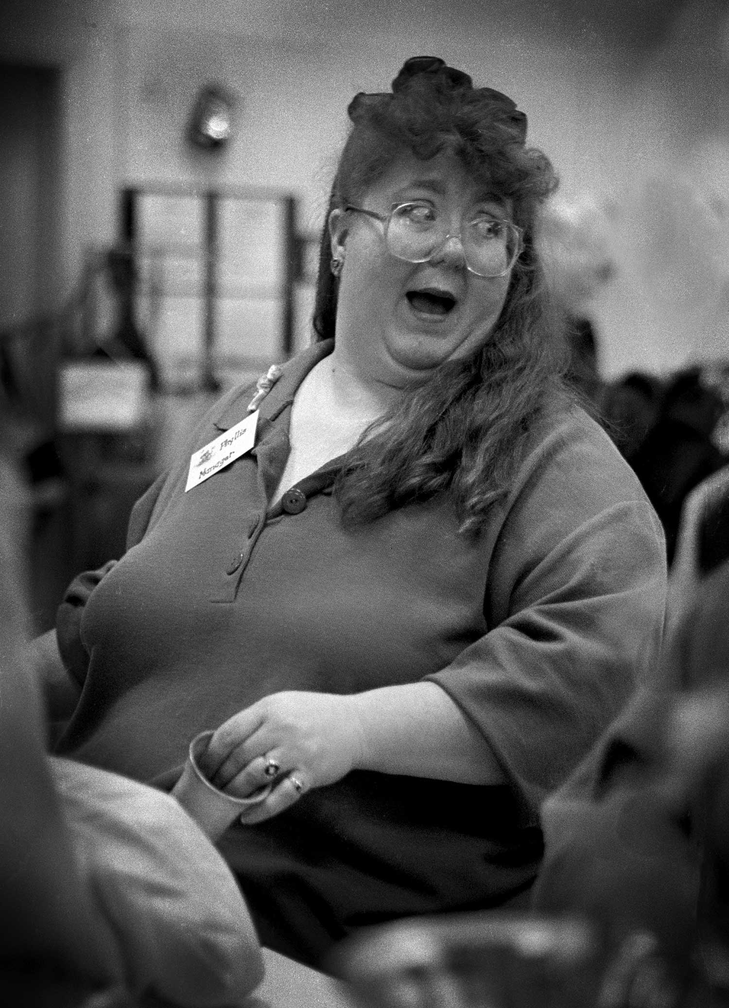 Phyllis Booth, manager of the Goodwill, laughs it up during the Teddy Bear Brigade. photo by Jessica Bocko  - 1997